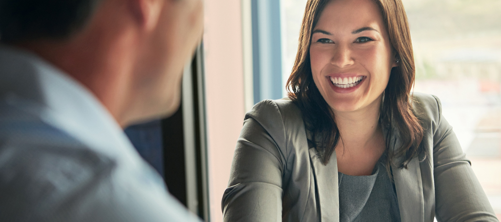 Woman smiling.